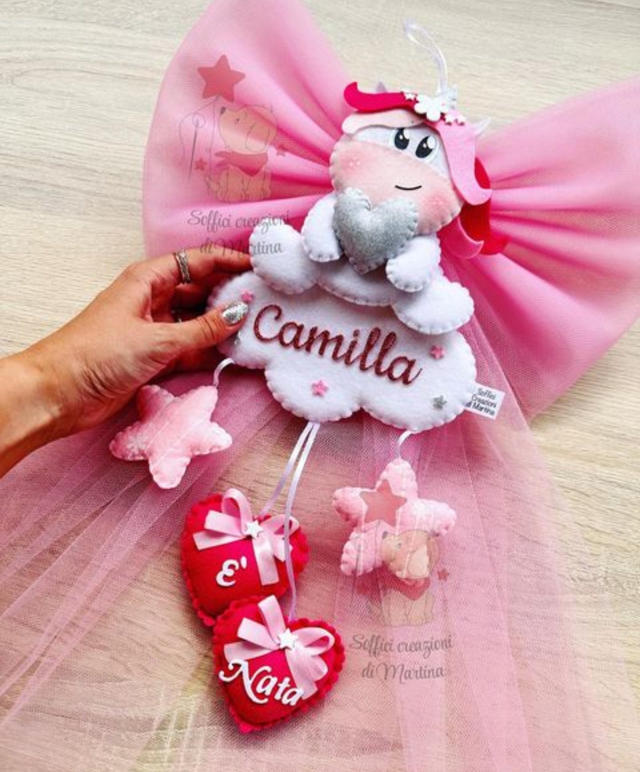 Fiocco con unicorno sulla nuvoletta