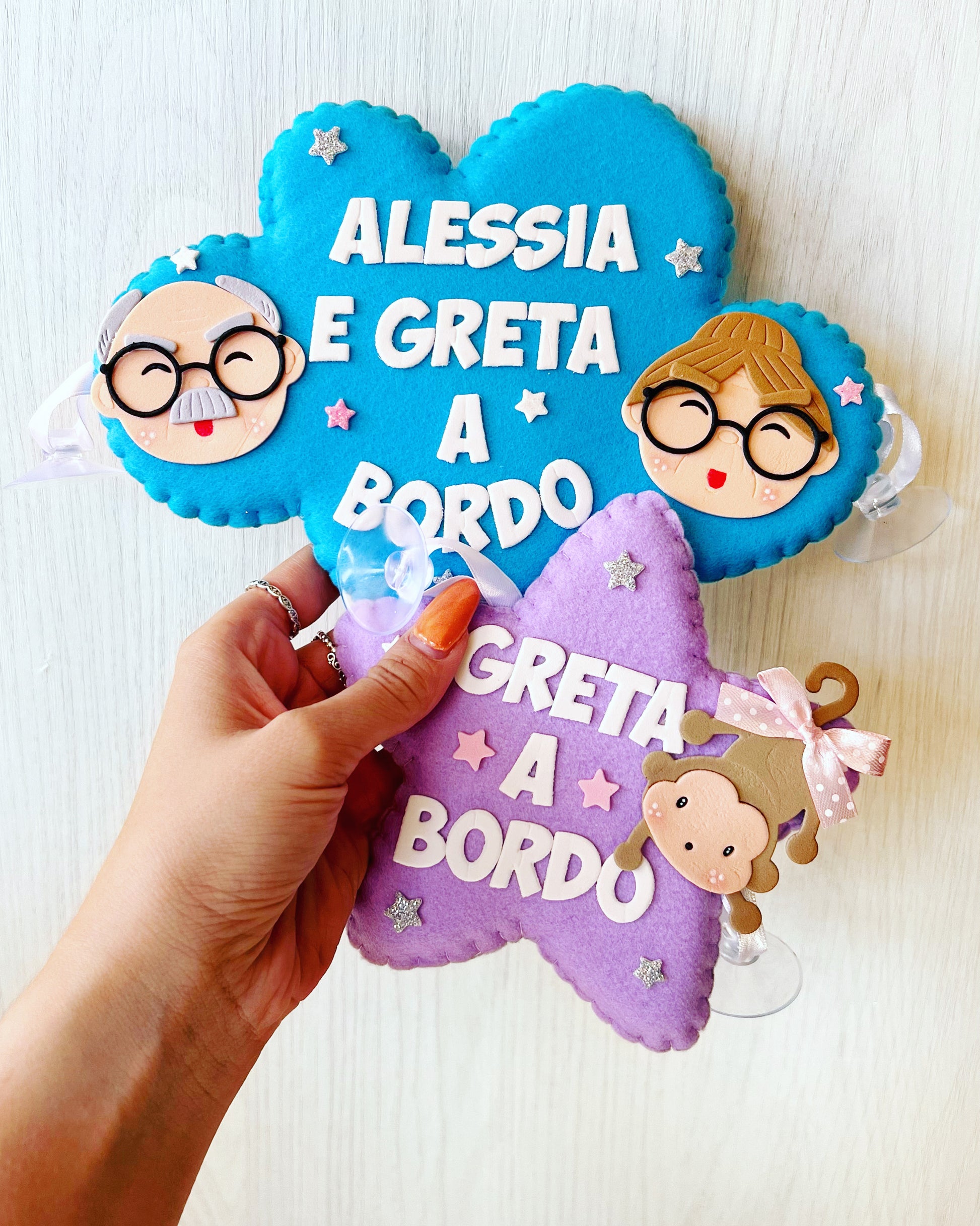 Bimbi a bordo in pannolenci a forma di stella o nuvoletta 